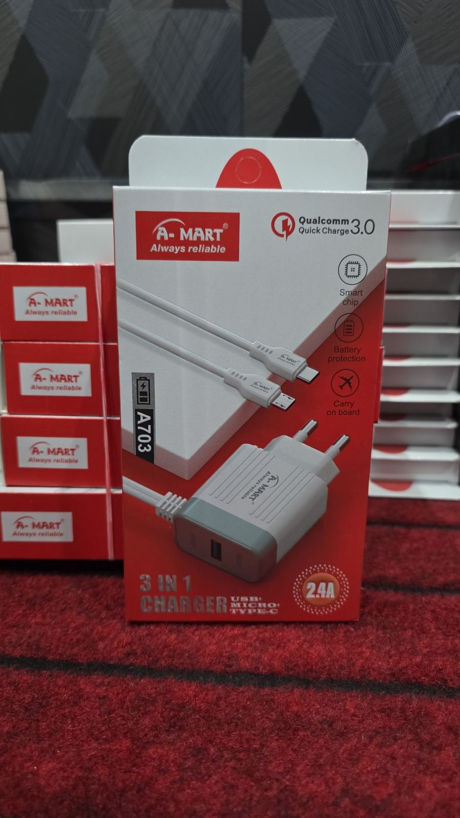 A-MART 3 IN 1 2.4A Charger (Model A703) featuring a white wall adapter and an included multi-connector cable